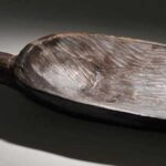 Photo: Wooden dipper from the Karluk One site. Koniag, Inc. Collection, AM193.