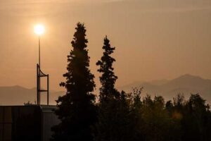  Wildfire smoke over UAA's Anchorage campus in 2019. (Photo by James Evans / University of Alaska Anchorage)
