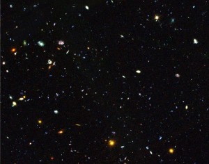Hiding among these thousands of galaxies are faint dwarf galaxies residing in the early universe, between 2 and 6 billion years after the big bang, an important time period when most of the stars in the universe were formed. Some of these galaxies are undergoing starbursts. Image Credit: NASA and ESA