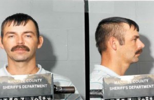 Joseph May in a 1990's manatee County Booking photo.