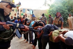 This image, uploaded to a militant website on June 14th, shows ISIL fighters leading away captured Iraqi soldiers.