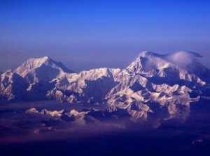 The snow-capturing peaks of the Alaska Range, including 17,400 foot Mount Foraker, left, and 20,320 foot Mount McKinley. Photo by Ned Rozell.