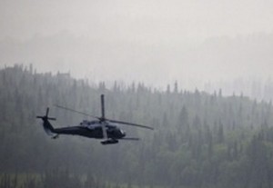 An Alaska Air National Guard HH-60 "Pave Hawk", from the 210th Rescue Squadron, performing a simulated search and rescue pattern.(Photo by Lt. Bernie Kale)