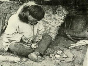 Alaska Native ivory worker circa 1910.