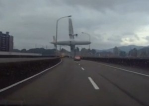 A TransAsia Airways (6702.TW) plane with 58 passengers crashing into the river shortly after takeoff.Image Dashboard cam