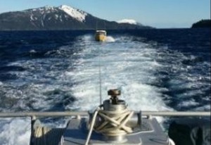 A Coast Guard Station Valdez 45-foot Response Boat - Medium crew provides a tow to the 24-foot Bayliner Herrisea near Whittier, Alaska, March 8, 2015. The rescue boatcrew assisted the three mariners aboard the Herrisea after the main engine failed. U.S. Coast Guard photo by Petty Officer 2nd Class Dayron Lopez.