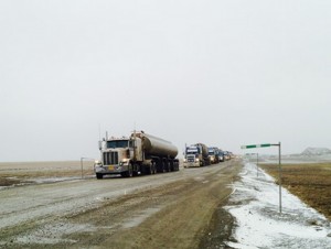 The first vehicles traveling north on the Dalton Highway, Mile 412. ADOT&PF photo.
