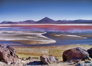 Laguna Colorada is a shallow salt lake in the southwest of Bolivia. One of several places on Earth whose colors are affected by nonphotosynthetic pigments. UW doctoral student Eddie Schwieterman has published research on how such nonphotosynthetic biosignatures might appear on exoplanets, or those outside our solar system. Noemí Galera / Flickr