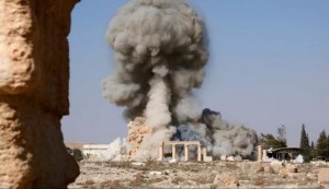 Smoke billowing from the Baal Shamin temple in in Syria's ancient city of Palmyra. Image-video screenshot