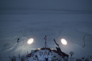 Coast Guard Cutter Healy crew members use spotlights while navigating through ice Sept. 20, 2015, while underway in the Arctic Ocean. (U.S. Coast Guard photo by Petty Officer 2nd Class Cory J. Mendenhall)