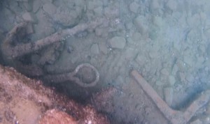 A small anchor and other objects that were observed during the Lost Whaling Fleets expedition. (Credit: NOAA)