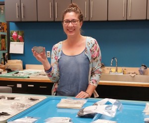 Anna Donaldson works with artifacts in the Alutiiq Museum’s laboratory, 2015. Photograph Courtesy the Alutiiq Museum.
