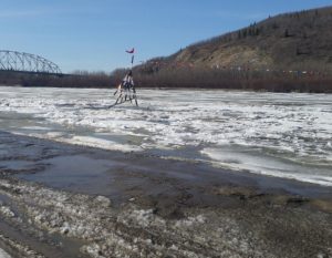 the Nenana Ice Classic tripod as it tips over tripping the clock at 3.39 pm AST on Saturday. Image-Nenana Ice Claqssic