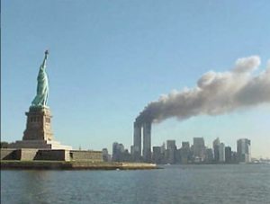 Smoke billowing from New York's Twin Towers following the attack by two airliners on 9/11. Image-National Park Service