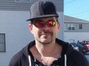 36-year-old John Bass was arrested on an Escape warrant on Sunday, troopers reported. Image-Facebook profile