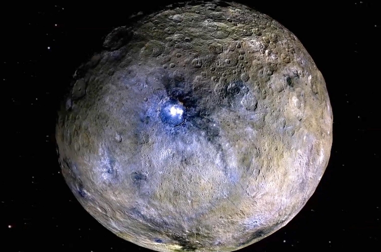 Dwarf planet Ceres is shown in these false-color renderings, which highlight differences in surface materials.Image credit: NASA/JPL-Caltech/UCLA/MPS/DLR/IDA