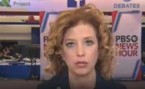 Debbie Wasserman-Shultz attempting to explain away suspicions of a rigged primary to Jack Trapper on the PBS Newshour in February 2016. Image-Screengrab PBS