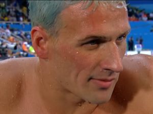 Swimmer Ryan Lochte and three others reported being robbed at gunpoint on Sunday. Image-Video Screengrab