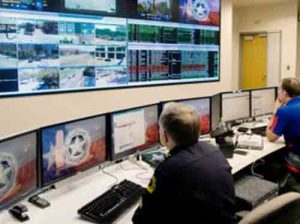 Law enforcement officials working in a fusion center. Image-Homeland Security Information Center
