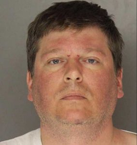44-year-old Thomas Bloedel was jailed and his dog taken to the vet for treatment of alcohol poisoning on Thursday. Image-Pennsylvania mugshot