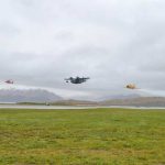 Coast Guard Cutter Midgett’s aviation detachment conducts flyovers alongside historic WWII airplanes, a Grumman JRF-5 Goose and a Canadian Harvard MK IV training plane, in Dutch Harbor. U.S. Coast Guard photo