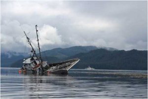 The Coast Guard Cutter Bailey Barco (WPC-1121) responds to the grounding of the vessel Deceptive C near Wrangell