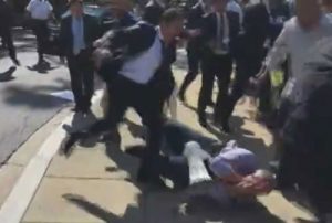 Turkish security official kicking man with bullhorn in Washington D.C. Image-VOA