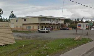 Police in Anchorage are investigating a homicide at Aurora Paint Company, and have a person of interest in custody. Image-Google Maps