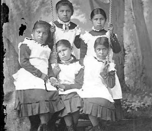 Portrait of group of Carlisle Indian Industrial School students in uniform, 1894. Photo by John N. Choate. Photo Lot 81-12 06820900, National Anthropological Archives, Smithsonian Institution, Washington, D.C.