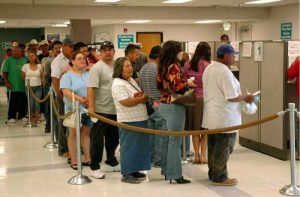 Unemployed in line at employment office. Image-FEMA