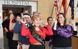 Cultural song and sway...Naval Hospital Bremerton (NHB) staff members join visiting members of the S’Klallam tribe in a traditional dance during NHB's American Indian and Alaska Native Heritage Recognition ceremony held on Nov. 17, 2017 (Official Navy photo by Douglas H Stutz, Naval Hospital Bremerton Public Affairs).