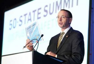 Deputy Attorney General Rod Rosenstein speaking at the 50-state Public Safety Summit. Image-CSG Justice Center/Twitter