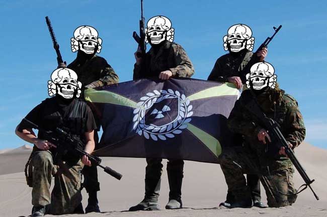 In a photo obtained by ProPublica, armed Atomwaffen members pose in the desert in Nye County, Nevada at their Death Valley Hate Camp in January 2018