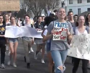 Student protesters marching for gun control. Image-VOA