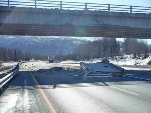 Damage at Artillery Road Bridge near Eagle River. Image-DOT