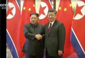 Chinese president Xi Jinping and North Korean leader Kim Jong Un shaking hands in Beijing. Image-Xinhua.