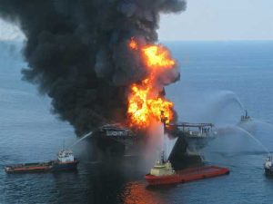 Platform supply vessels battle the blazing remnants of the off shore oil rig Deepwater Horizon. Image-USCG