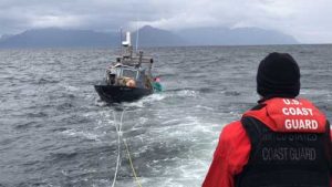 A Coast Guard Station Juneau 45-foot Response Boat–Medium crew assists the disabled 28-foot bar tender MINI B in Stephens Passage, near Holkham Bay, approximately 38 miles from downtown Juneau.U.S. Coast Guard courtesy photo.