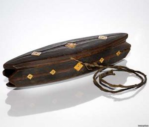 A late 19th Century Yupik Qungasvik (toolbox), made of carved wood and bone. Courtesy, National Museum of the American Indian, 55284.