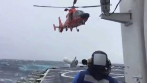 USCG Dolphin helicopter landing on the cutter John Midgett during emergency medevac on May 6th. Image-USCG