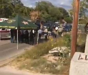 Authorities loading fatally shot immigrant in Rio Bravo, Texas. Image-screenshot Marta Martinez FB video