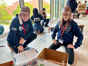 Photo courtesy of Maynard Maglaya
Students on the Discovery Peak Charter School Dinos team prepare for the helicopter challenge at the 2025 Science Olympiad national tournament at the University of Nebraska-Lincoln. The team won first place in the 2025 Alaska state tournament held at UAF.