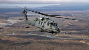 n Alaska Air National Guard HH-60G Pave Hawk helicopter assigned to the 210th Rescue Squadron flies over Joint Base Elmendorf-Richardson.(Alaska National Guard photo by Alejandro Peña)