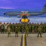 NORAD conducts Operation NOBLE DEFENDER in Pituffik, Greenland Members of NORAD's binational Air Task Force (ATF) pose for a group photo at Pituffik Space Base, Greenland. Photo: Master Corporal Bélynda Casse, 3 Wing Bagotville