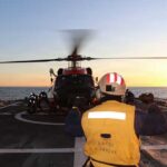 U.S. Coast Guard Cutter Waesche returns to Alameda after successful 113-day patrol in Bering Sea U.S. Coast Guard Ensign Garth Bowman, a landing signal officer assigned to U.S. Coast Guard Cutter Waesche (WMSL 751), directs an MH-60 Jayhawk helicopter from Air Station Kodiak during flight operations in the Bering Sea. (U.S. Coast Guard photo by Petty Officer 3rd Class Christian Swenk)