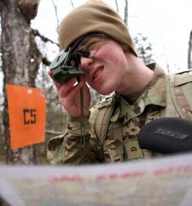 Army ROTC Cadet Jake Thacker, a student at the University of Alaska Anchorage, navigates during an April 16 land navigation course at Alcantra National Guard Armory Complex. Thacker earned and is using a Guaranteed Reserve Forces Duty Minuteman Scholarship to pay for college. (Alaska National Guard photo by David Bedard)
