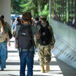 UAA awarded Military Friendly School silver designation Students walk past the Administration/Humanities Building during the first week of UAA's fall 2026 semester. (Photo by James Evans / University of Alaska Anchorage)