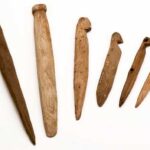 Photo: Two types of wooden snare pins, Karluk One site, Koniag, Inc. Collection. AM193.