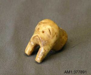 Photo: Ivory carving of a walrus head. Uyak site, Larsen Bay Alaska, courtesy of the Larsen Bay Tribe.
