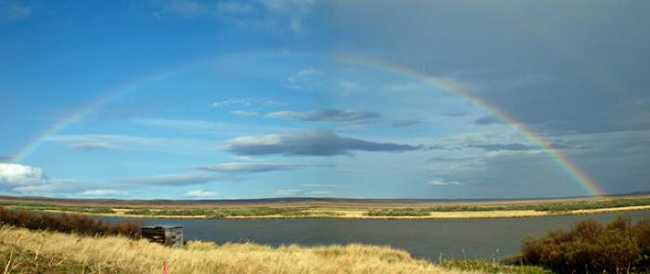 Photo: A rainbow over the King Salmon River, western Alaska Peninsula, 2011.